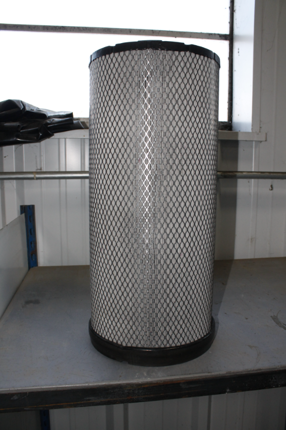 A cleaned cylindrical mesh filter after washing and drying